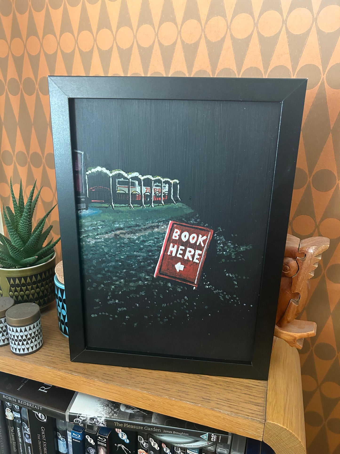 ‘What is it you need from me? What can I do for you exactly?’ A4 night painting. Acrylic on board. Framed. Fun Fair 2024 21