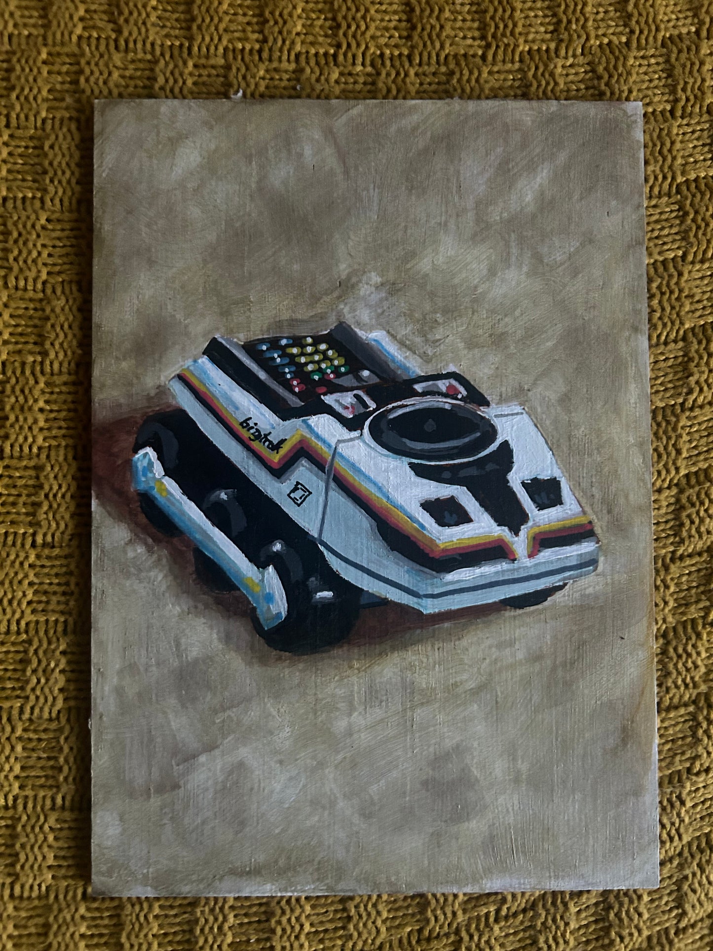 ‘Don’t Pretend’. Painting of Big Trak toy. Acrylic on board. Framed. 2025.