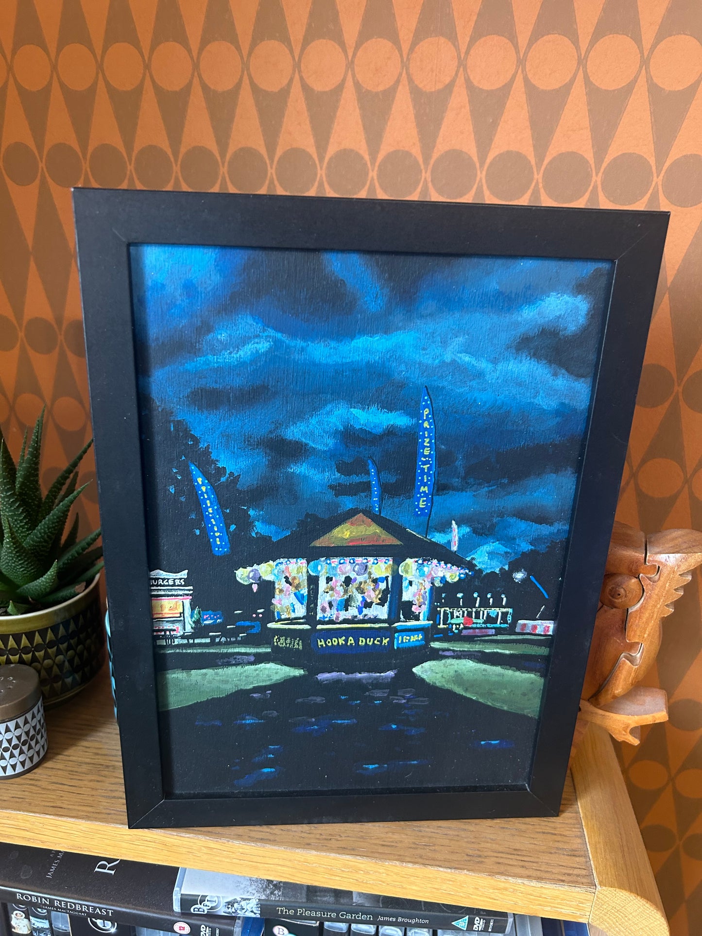 ‘I love these times. I want to stay’ A4 night painting. Acrylic on board. Framed. Fun Fair 2024 10