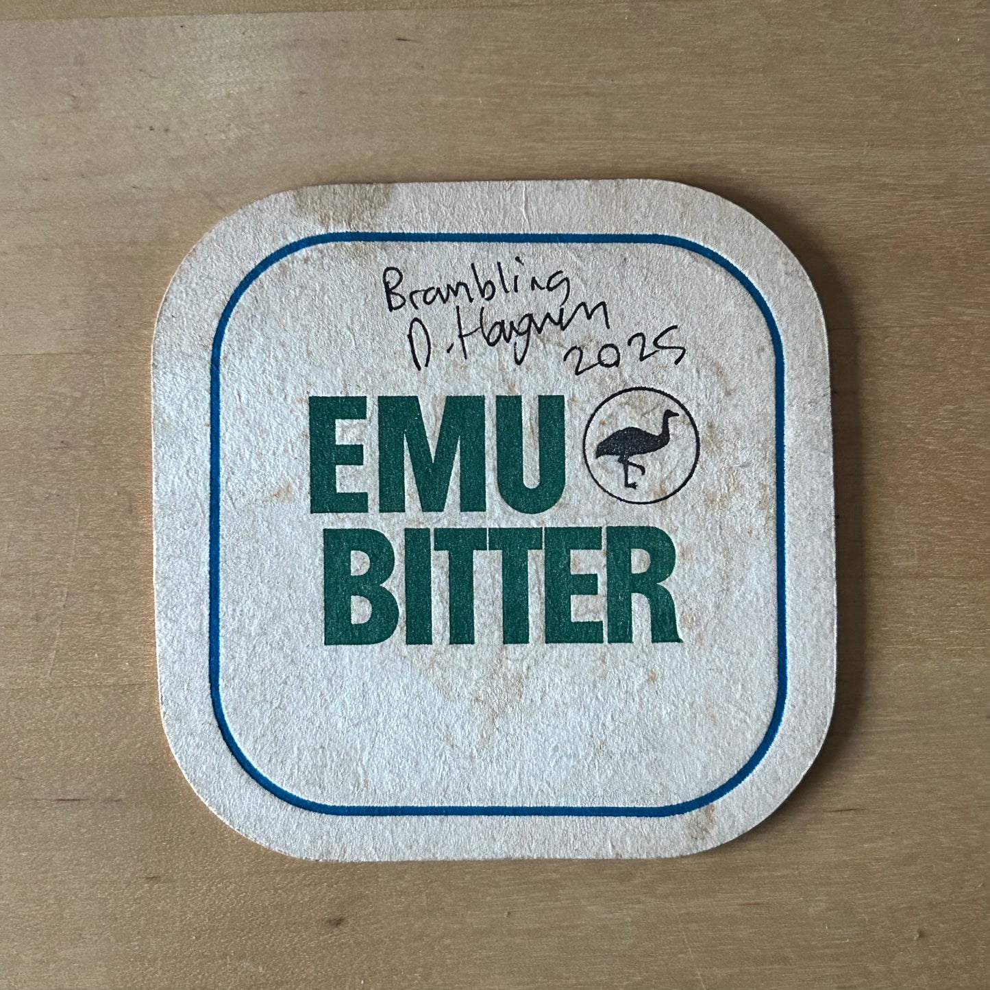 A Brambling painted onto a Emu bitter beer mat from the 1970s. Beermat painting. Watercolour.