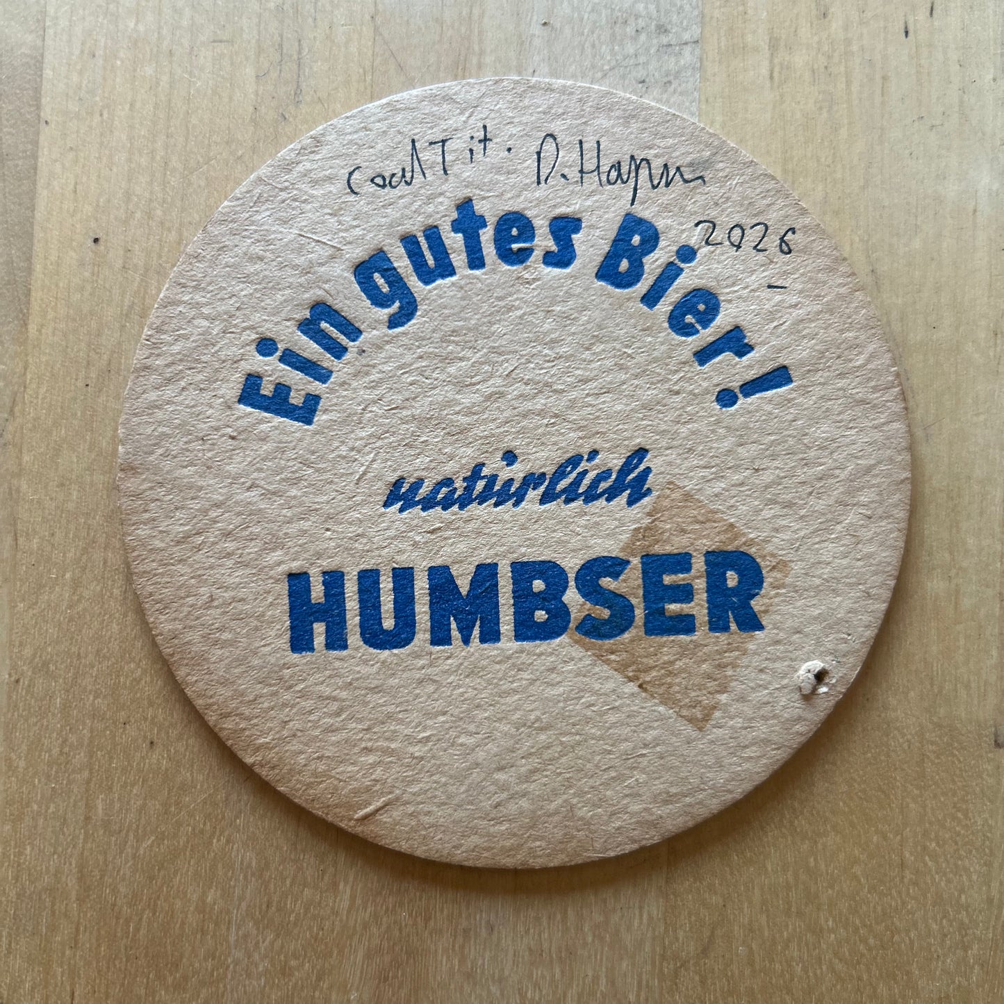 A Coal Tit painted onto a Humbser Biere drinks mat from the 1950s. Beermat painting. Watercolour.