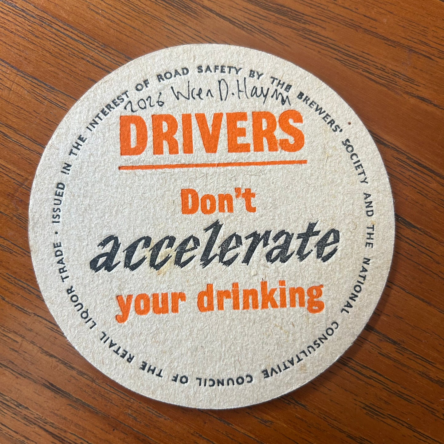 A Wren painted onto a ‘Drivers Don’t Accelerate Your Drinking’ drinks mat from the 1950s. Beermat painting. Watercolour.