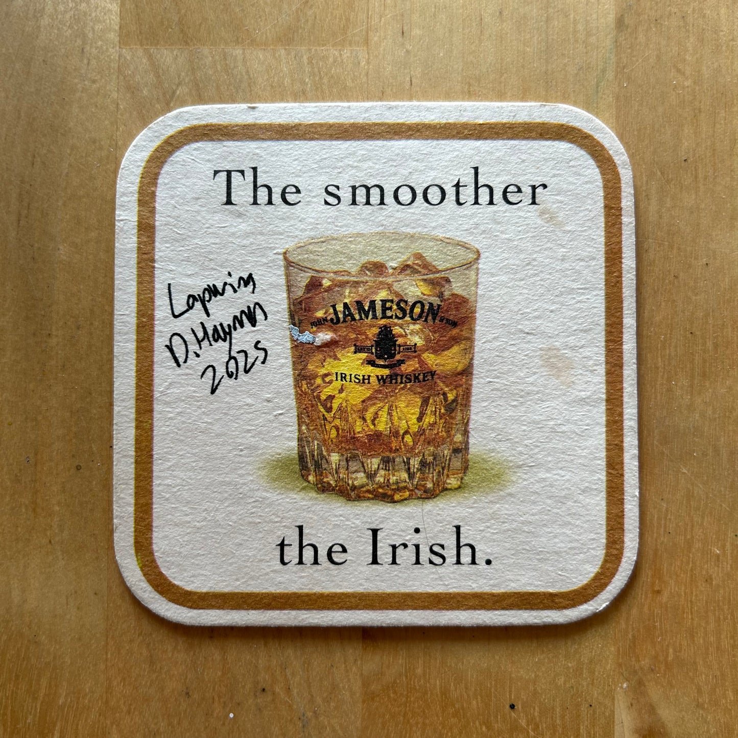 A Lapwing painted onto a Jameson drinks mat from the 1980s. Beermat painting. Watercolour.