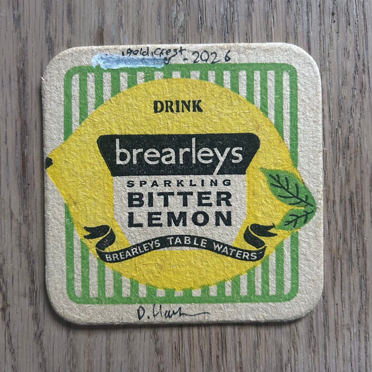 A Goldcrest painted onto a Brearley’s soft drinks mat from the 1950s. Beermat painting. Watercolour.