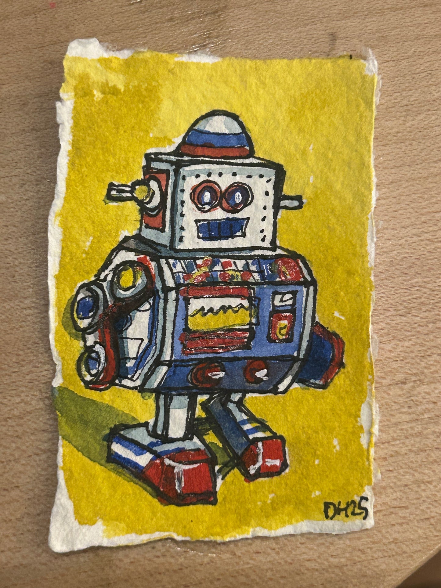 Tiny cotton rag paper water colour painting of a toy robot 4/7 approx 5.5 cm x 8 cm.