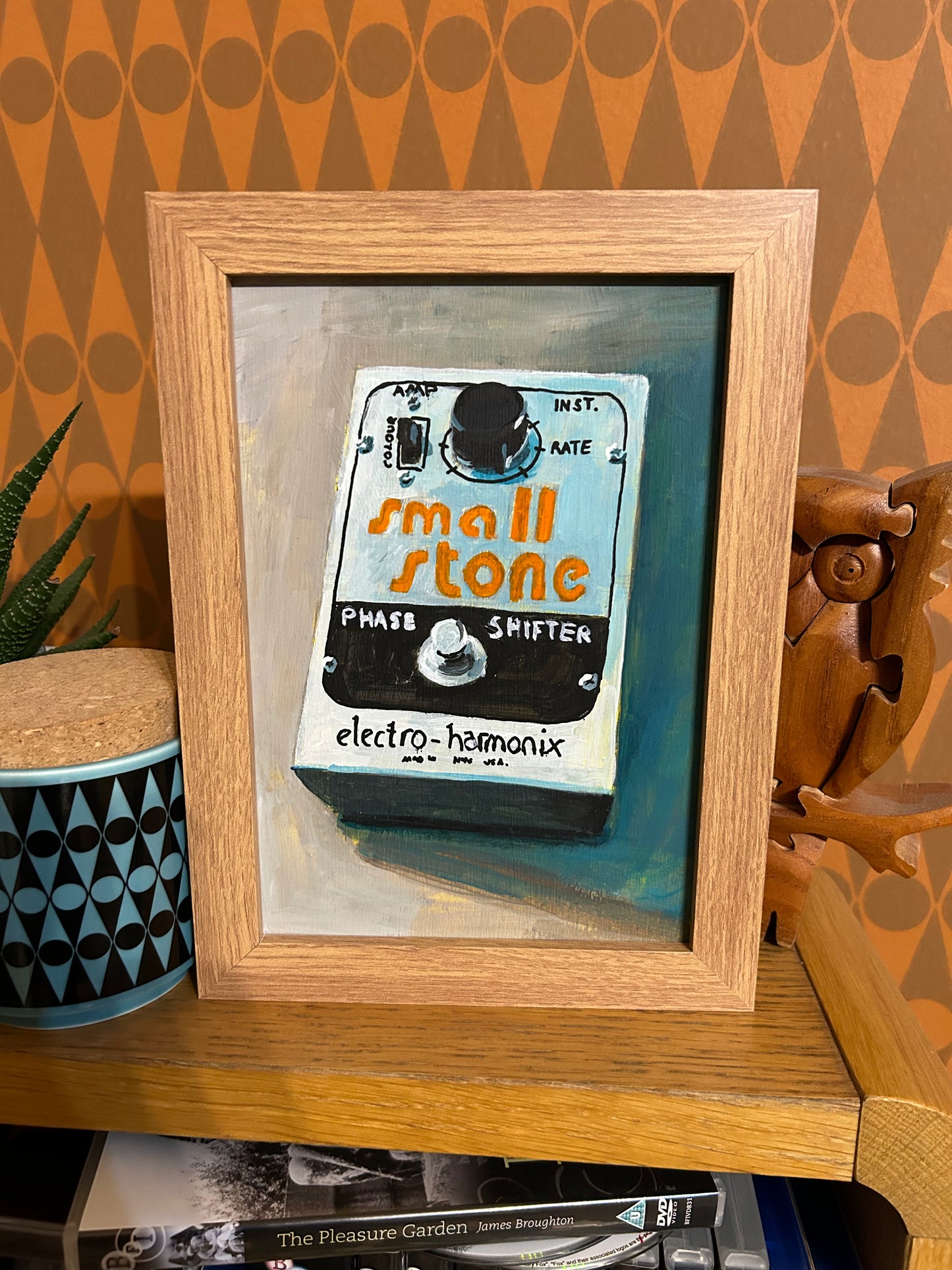 Phase Shifter. Painting of Electro-Harmonix guitar effects pedal. Acrylic on board. Framed. 2025