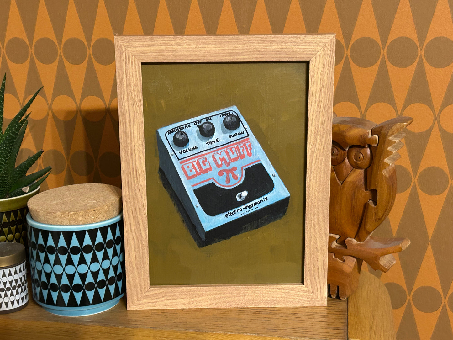 Big Muff. Painting of Electro-Harmonix guitar effects pedal. Acrylic on board. Framed. 2025