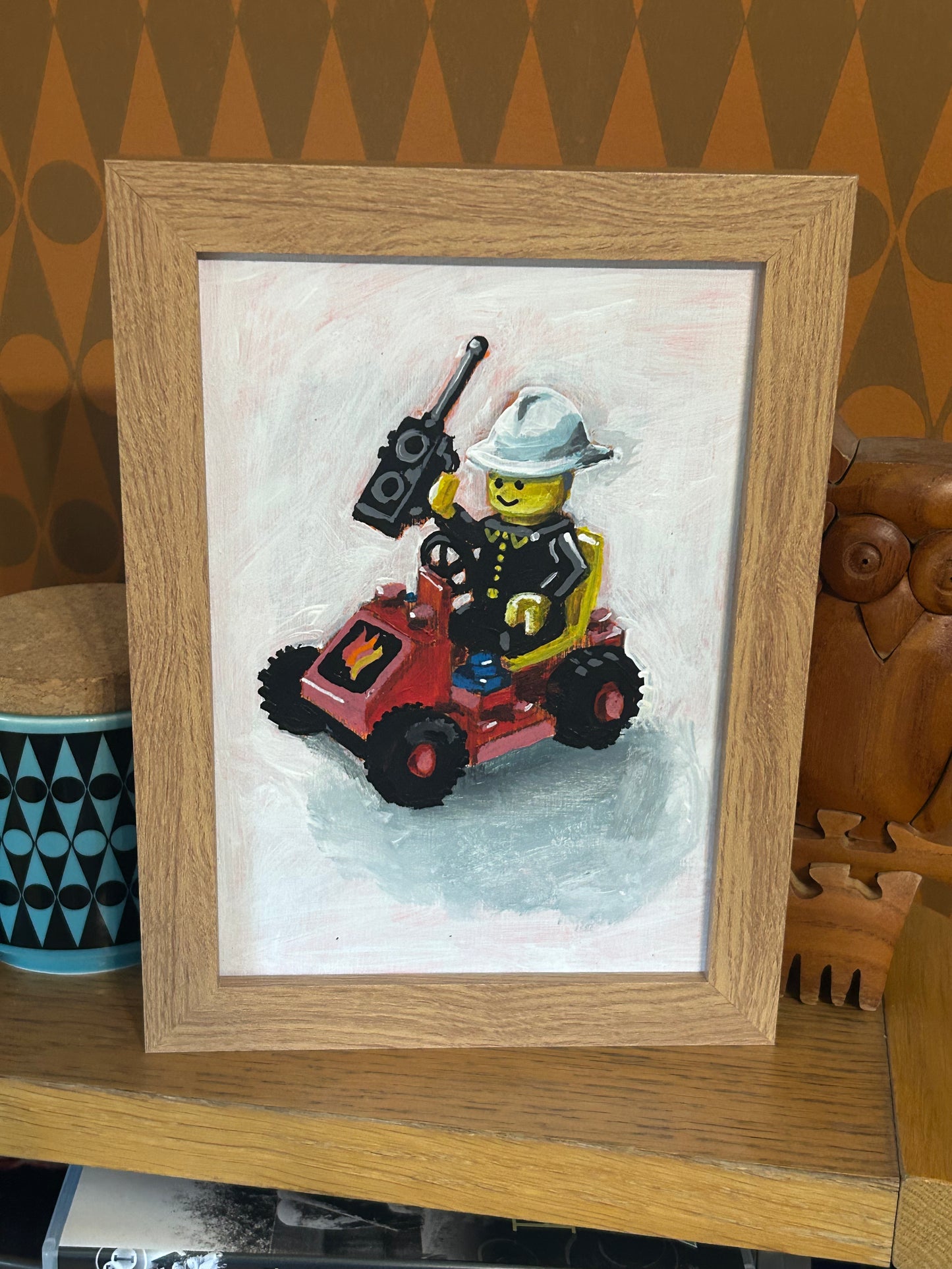‘Didn’t I save us?’ Lego set 6611. A5 painting. Acrylic on board. Framed. 2025