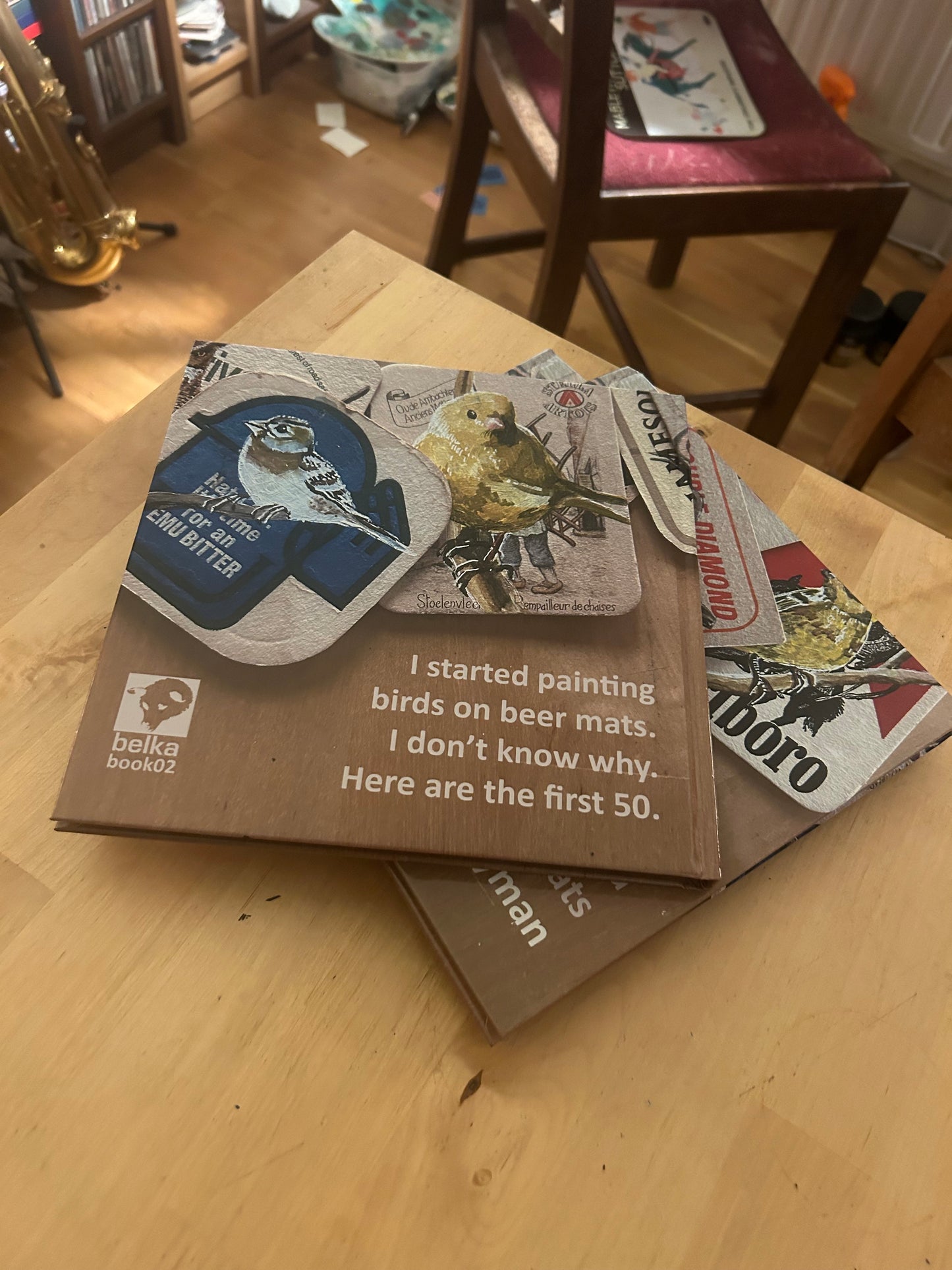 Birds on Beer Mats. A 104 page hardback book. 21cm x 21cm.
