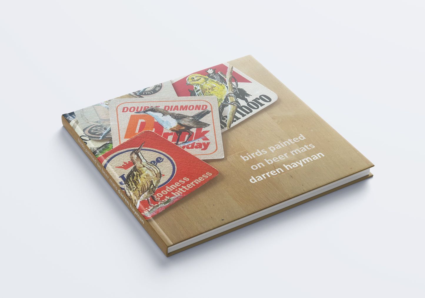 Birds on Beer Mats. A 104 page hardback book. 21cm x 21cm.