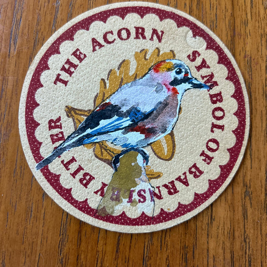 An Eurasian Jay painted onto a ‘’Barnsley Bitter” Beer Mat from the 1960s. Beer mat painting. watercolour and acrylic on card.