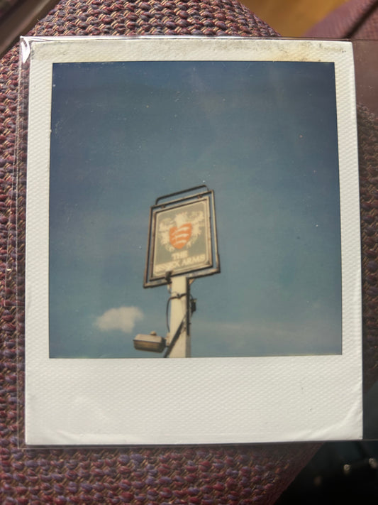 Polaroid photo 007. A Polaroid photo by Darren used as part of the artwork for his album ‘Essex Arms’. Darren will sign the back of the photograph.