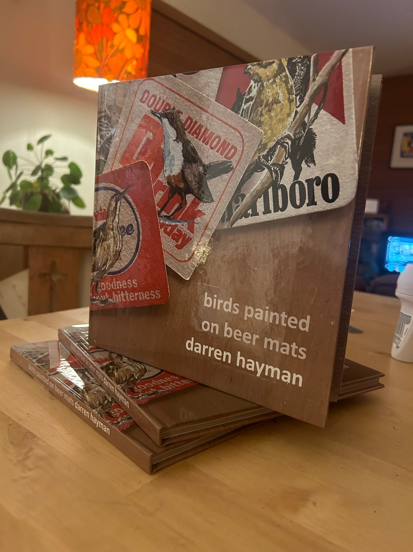 Birds on Beer Mats. A 104 page hardback book. 21cm x 21cm.