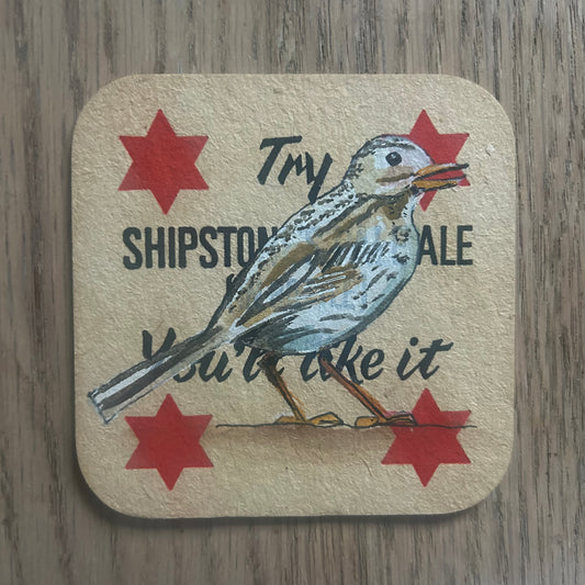 A Meadow Pipit painted onto a Shipstone Pale Ale beer mat from 1967. Beermat painting. Watercolour.