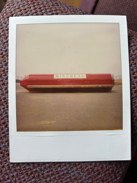 Polaroid photo 002. A Polaroid photo by Darren used as the basis for Darren’s EP ‘Minehead’. Darren will sign the back of the photograph.