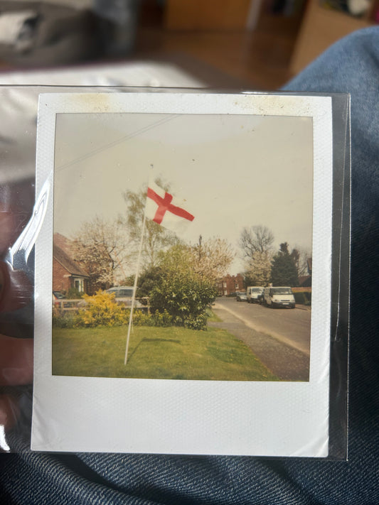 Polaroid photo 008. A Polaroid photo by Darren used as part of the artwork for his album ‘Essex Arms’. The picture is also featured heavily in the video ‘Calling Out Your Name’. Darren will sign the back of the photograph.