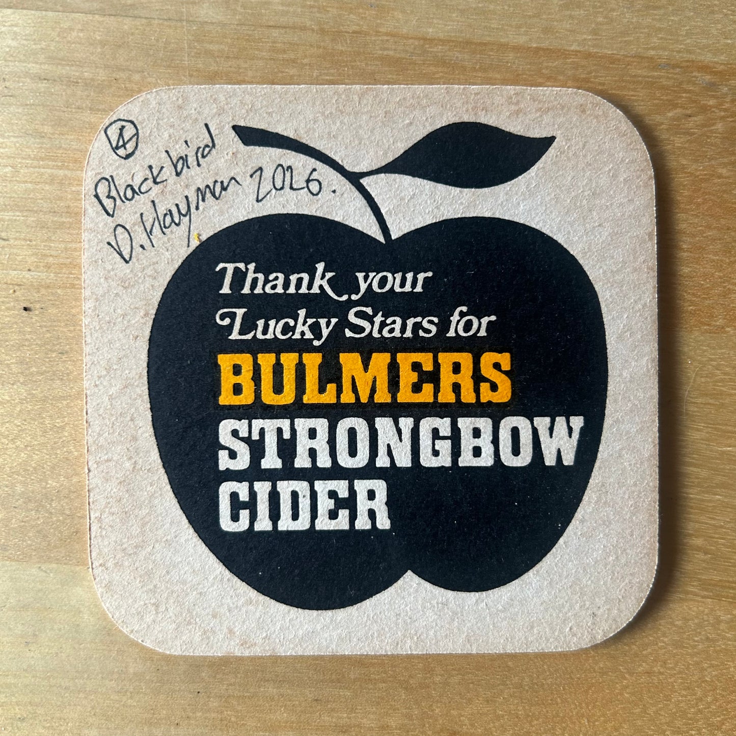 A Blackbird painted onto a 1970s Bulmer’s Cider Zodiac drinks mat (Cancer). Beermat painting. Watercolour.