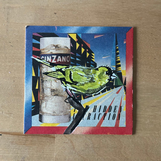 A Siskin painted onto a Cinzano drinks mat from the 1980s. Beermat painting. Watercolour.