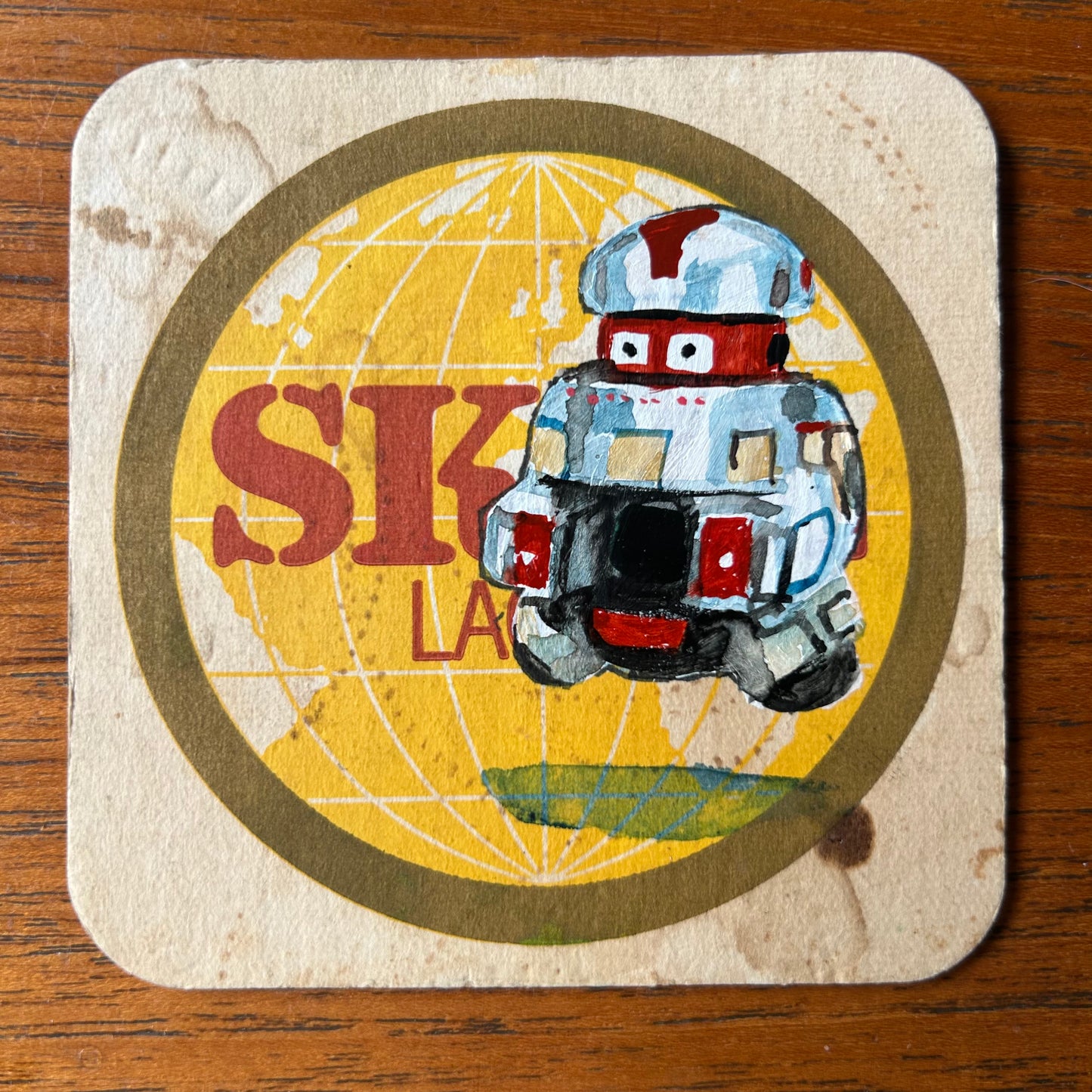 Old Bob and V.I.N.C.E.N.T (from the Black Hole movie) painted on two Skol lager Beermats. Beermat paintings. Watercolour.