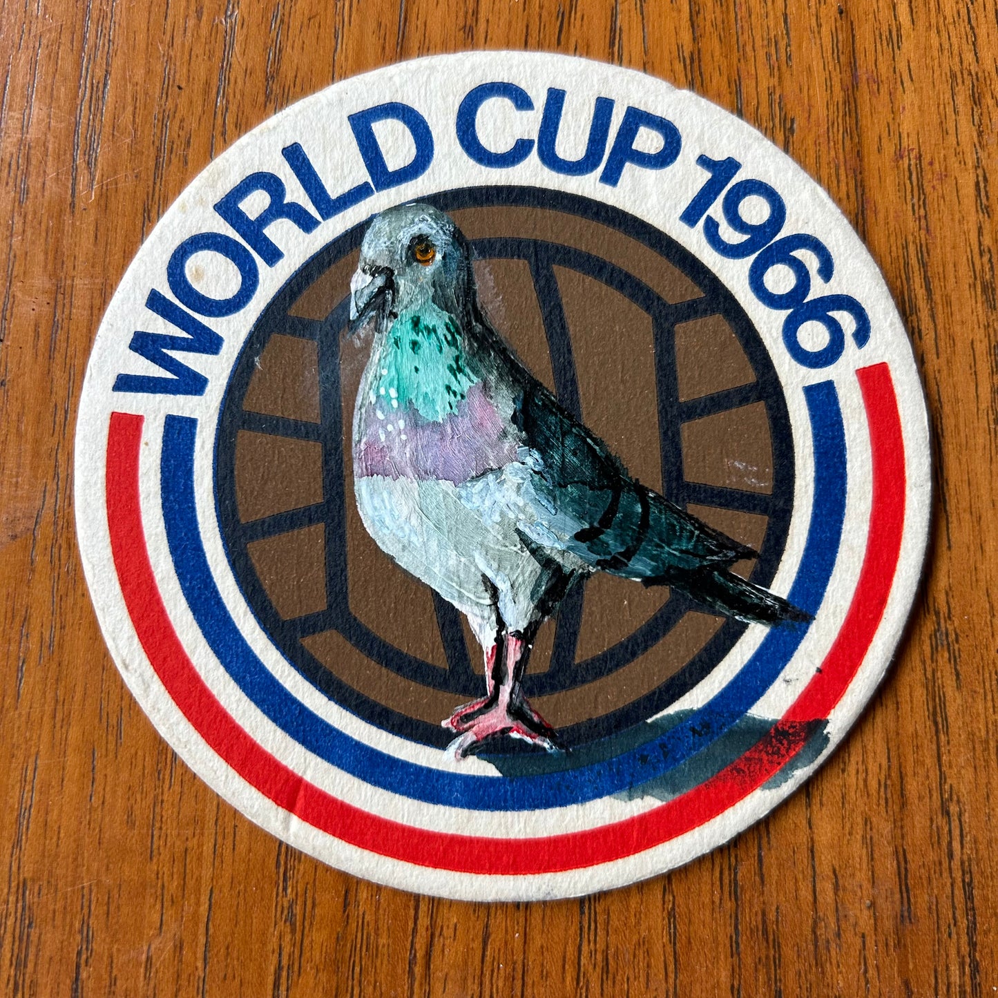 A Pigeon painted onto a 1966 World Cup beer mat. Beer mat painting. watercolour and acrylic on card. (Copy)