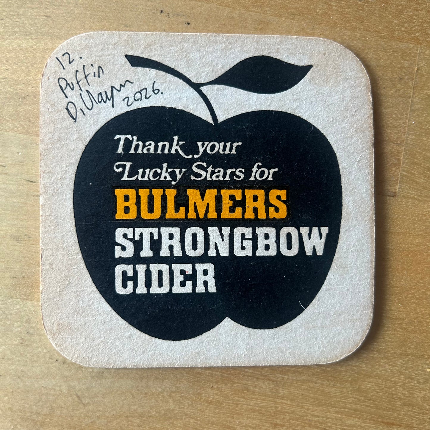 A Puffin painted onto a 1970s Bulmer’s Cider Zodiac drinks mat (Pisces). Beermat painting. Watercolour.