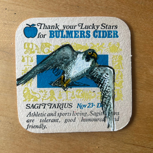A Pereguine Falcon painted onto a 1970s Bulmer’s Cider Zodiac drinks mat (Sagitarius). Beermat painting. Watercolour.