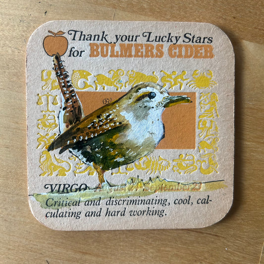 A Wren painted onto a 1970s Bulmer’s Cider Zodiac drinks mat (Virgo). Beermat painting. Watercolour.