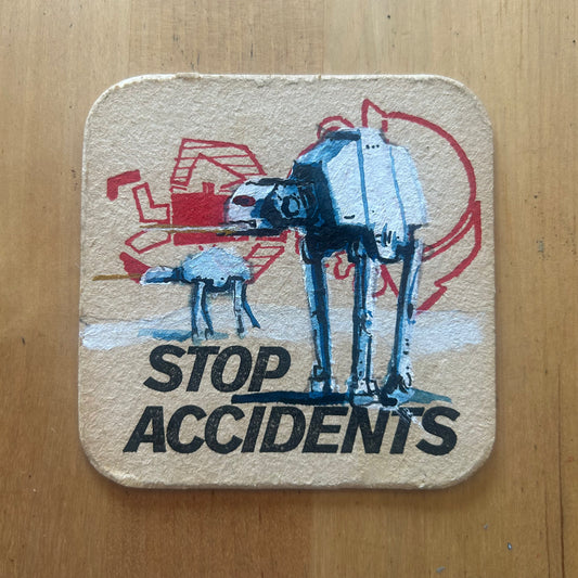 Two AT-ATs painted on a ‘Stop Accidents’ Beermat from the 1950s. Beermat painting. Watercolour.