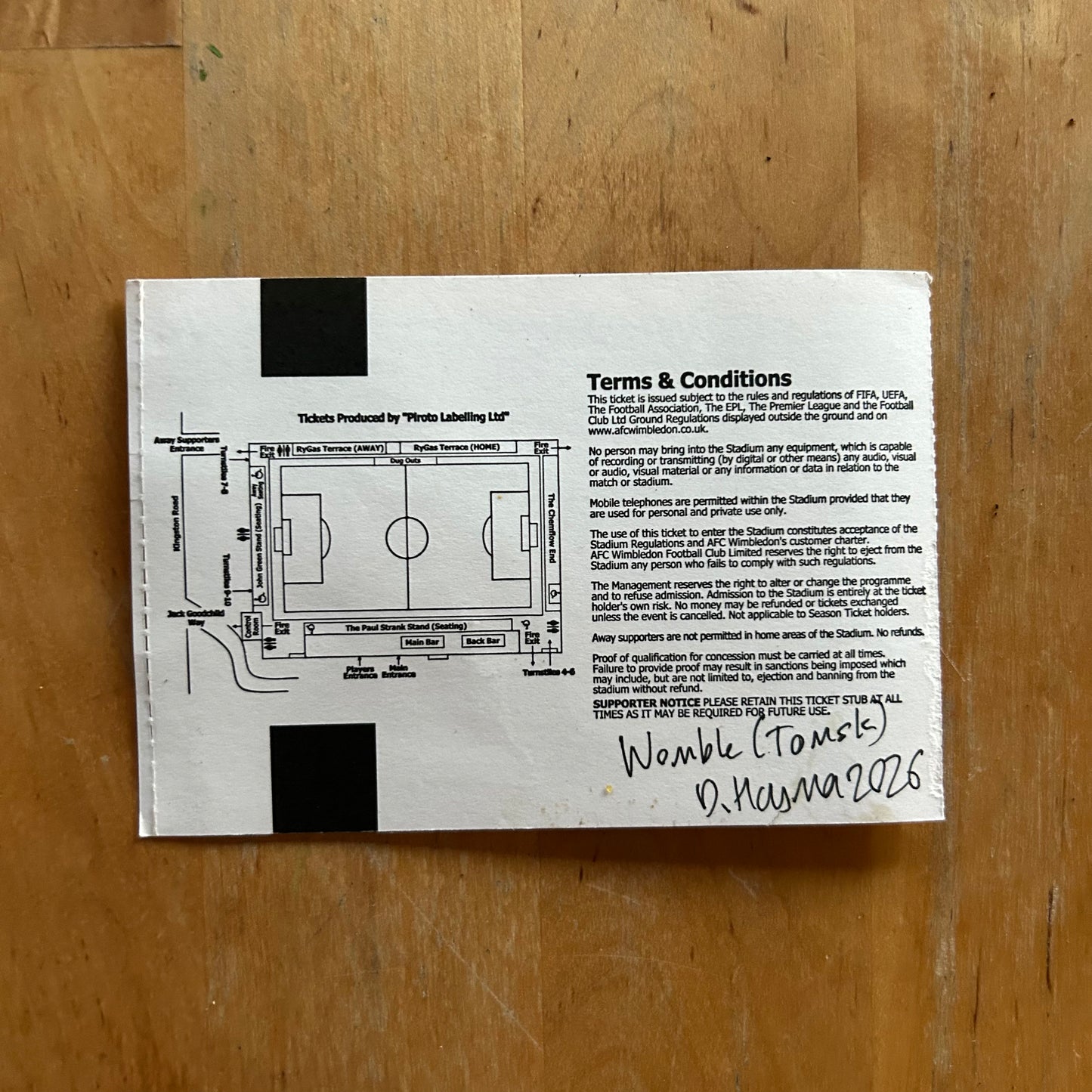 A Womble (Tomsk) painted onto a football ticket AFC Wimbledon v Fleetwood Town 08/02/20 Ticket League 1 - Watercolour.