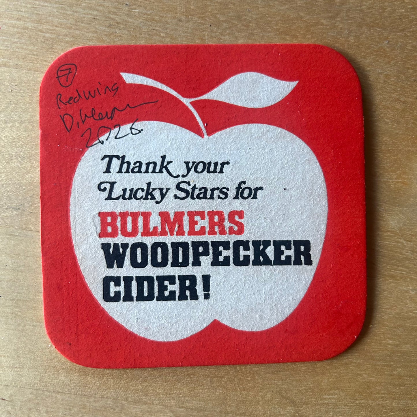 A Redwing painted onto a 1970s Bulmer’s Cider Zodiac drinks mat (Libra). Beermat painting. Watercolour.