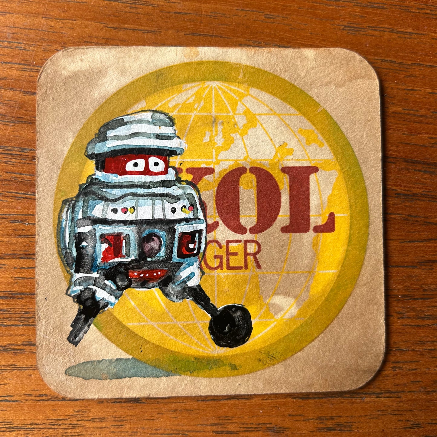 Old Bob and V.I.N.C.E.N.T (from the Black Hole movie) painted on two Skol lager Beermats. Beermat paintings. Watercolour.