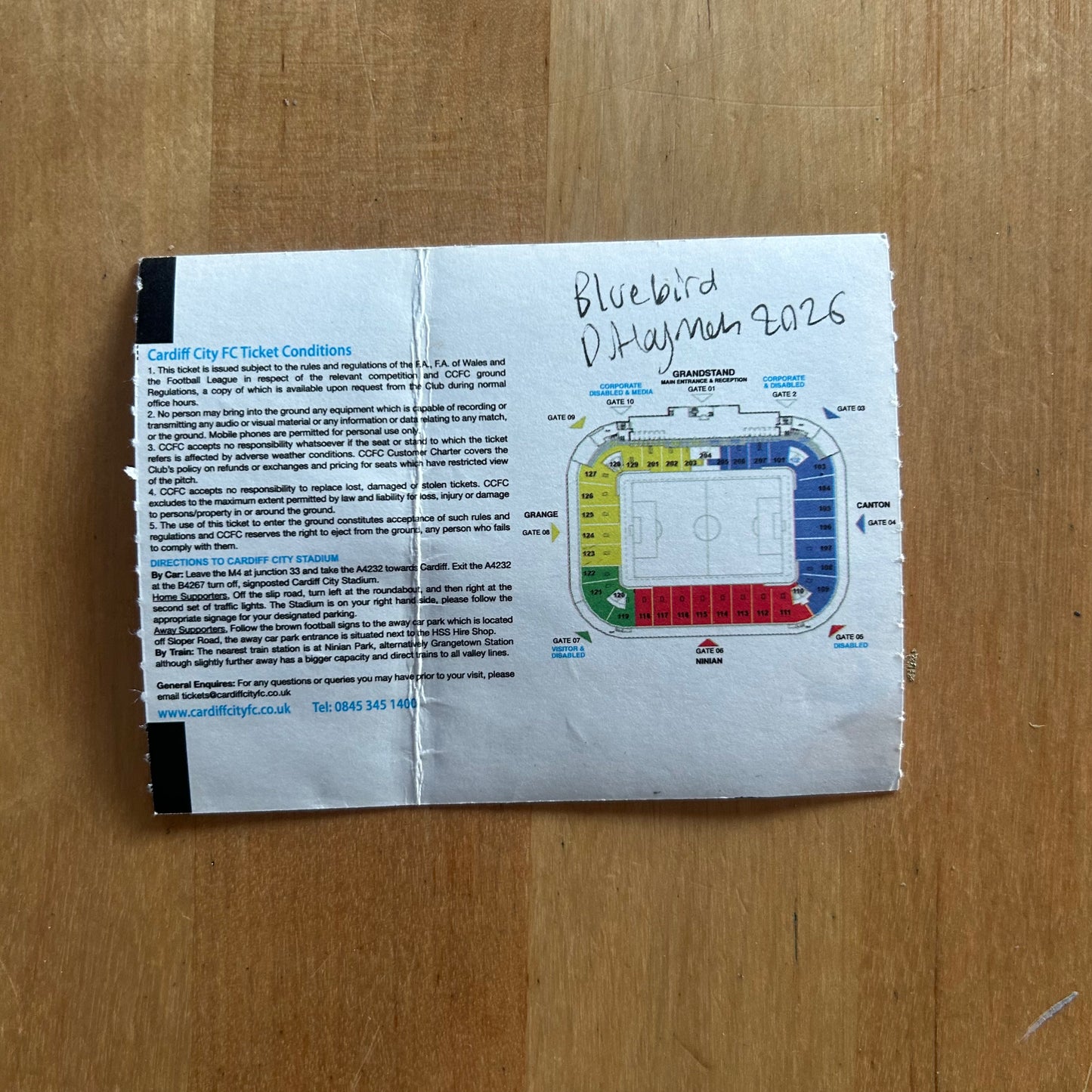 A Bluebird painted onto a A Canary painted onto a 2011-12 Cardiff City v Blackpool - Championship - Ticket Stub Watercolour.