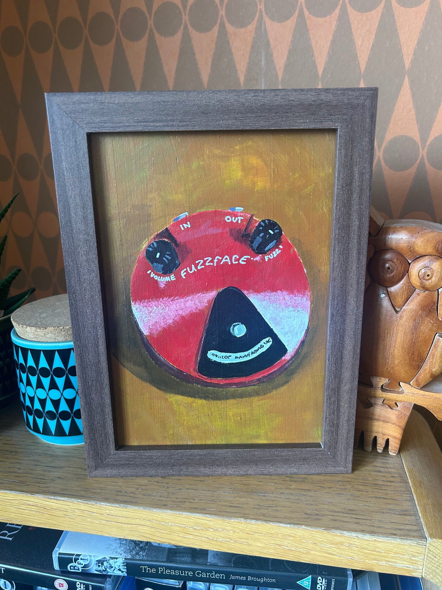 Fuzzface effects pedal. Painting of guitar effects pedal. Acrylic on board. Framed. 2025