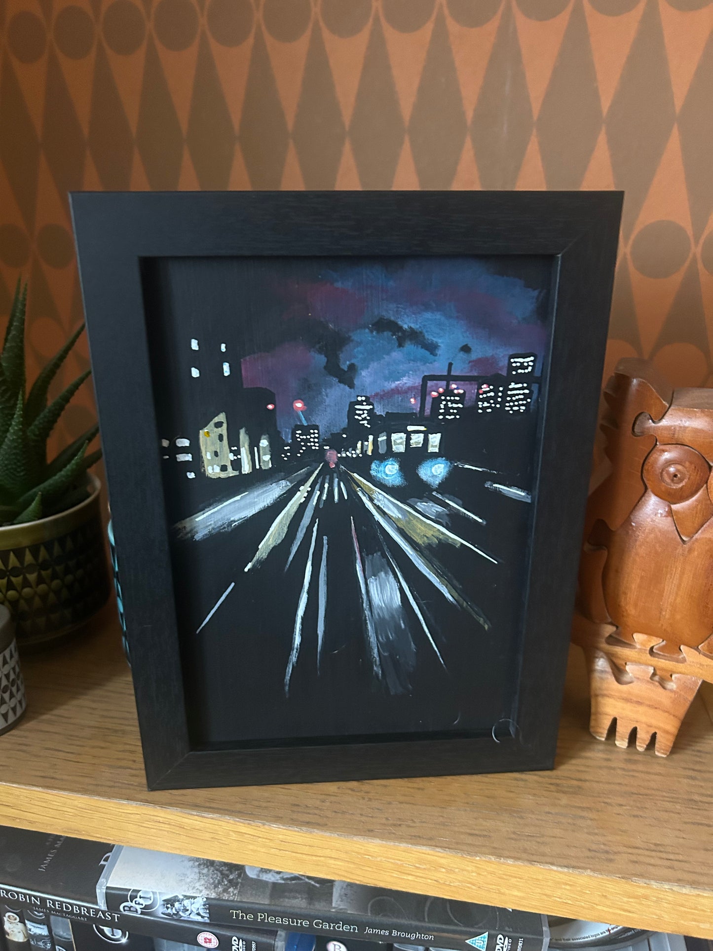 ‘I Drive the DLR’ A5 night painting. Acrylic on board. Framed. 2025