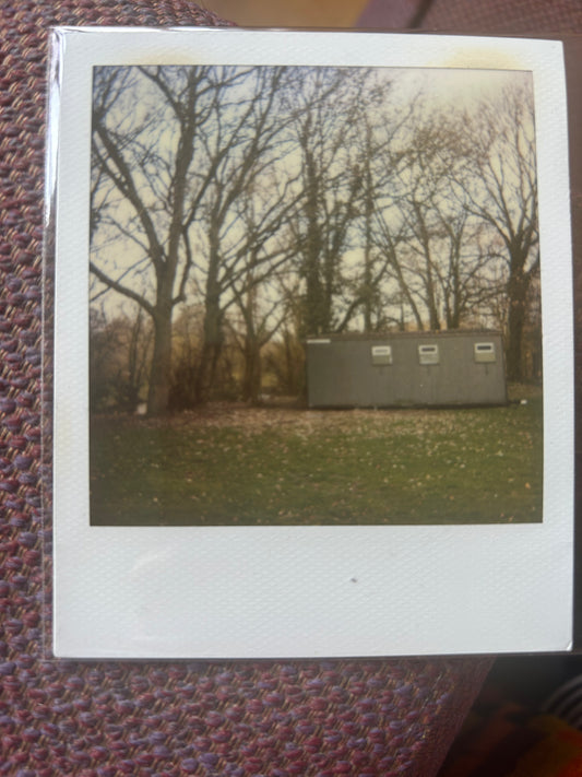 Polaroid photo 017. A Polaroid photo by Darren used as part of the artwork for his album Essex Arms. Darren will sign the back of the photograph.