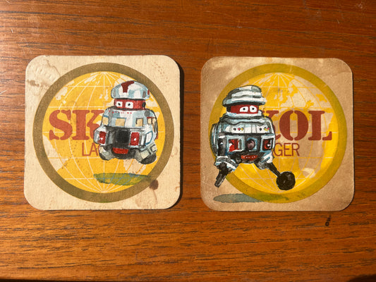 Old Bob and V.I.N.C.E.N.T (from the Black Hole movie) painted on two Skol lager Beermats. Beermat paintings. Watercolour.